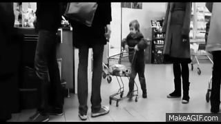 Kid_Slams_Random_Persons_Leg_Several_Times_With_a_Shopping_Cart