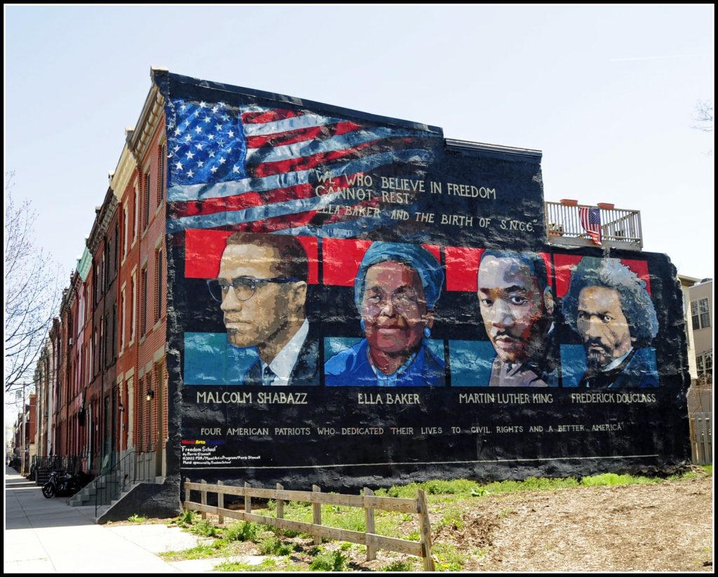 Mural Malcolm X, Martin Luther King Jr., bersama dua tokoh kulit hitam yang lain.